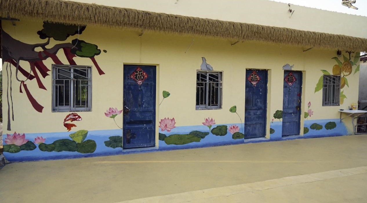 圖為實(shí)踐隊(duì)繪制墻繪成果展示